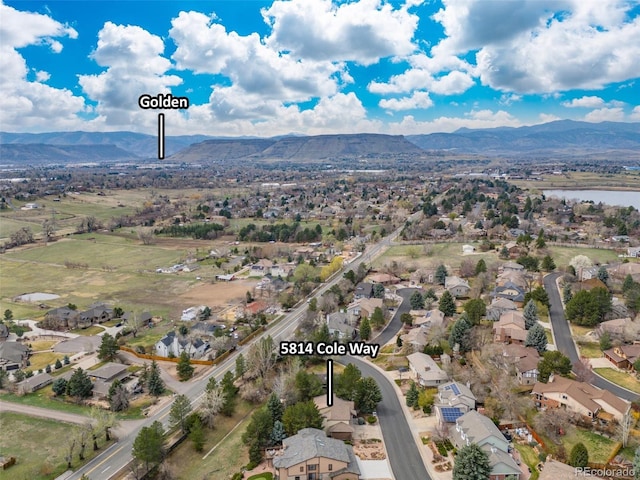 5814 Cole Way, Arvada, CO 80004 - aerial perspective of suburban area with a water and mountain view