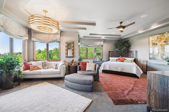 16134 Sandstone Dr, Morrison, CO 80465 - carpeted bedroom featuring a raised ceiling, ceiling fan, and recessed lighting