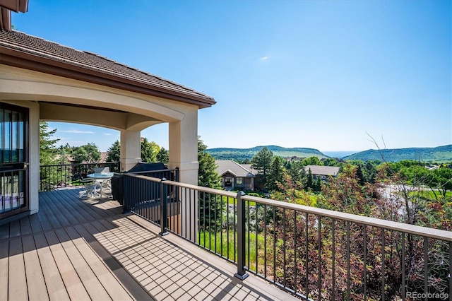 16134 Sandstone Dr, Morrison, CO 80465 - wooden deck featuring a mountain view