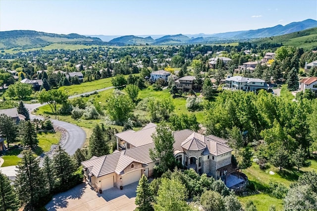 16134 Sandstone Dr, Morrison, CO 80465 - aerial view of residential area with a mountain backdrop
