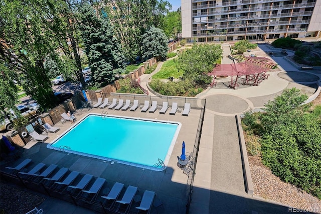 view of swimming pool with a patio area