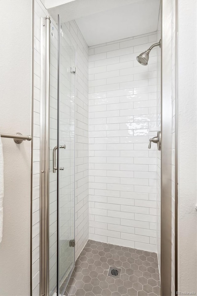 bathroom with an enclosed shower