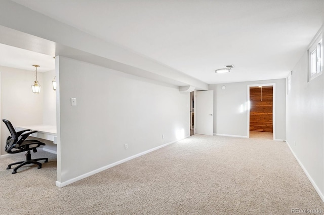 empty room featuring light carpet