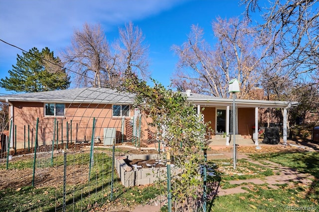 back of house with a patio area