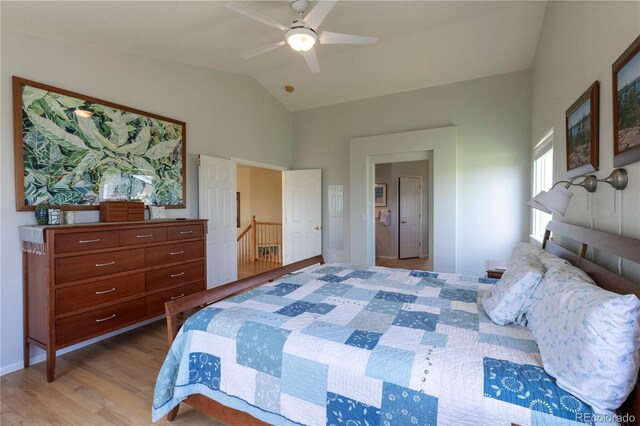 9586 W Victoria Dr, Littleton, CO 80128 - bedroom with a ceiling fan, baseboards, wood finished floors, and vaulted ceiling