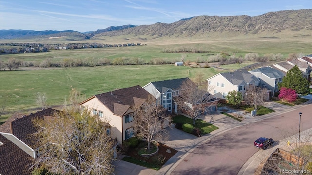 9586 W Victoria Dr, Littleton, CO 80128 - birds eye view of property with a mountain view and a rural view