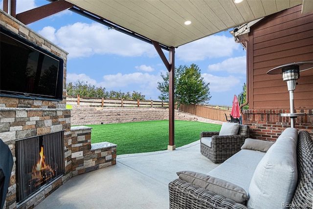 3745 Spanish Oaks Trl, Castle Rock, CO 80108 - fenced backyard featuring an outdoor stone fireplace and a patio