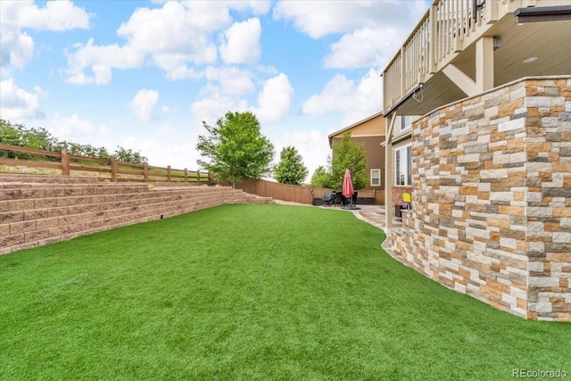 3745 Spanish Oaks Trl, Castle Rock, CO 80108 - fenced backyard with a patio area