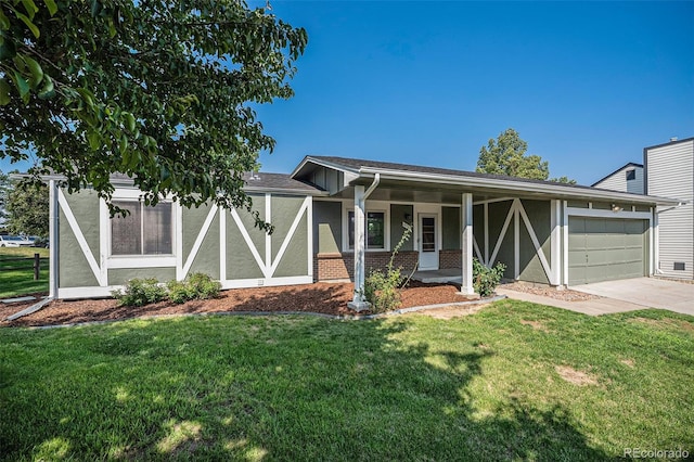 view of front facade featuring a garage and a front yard