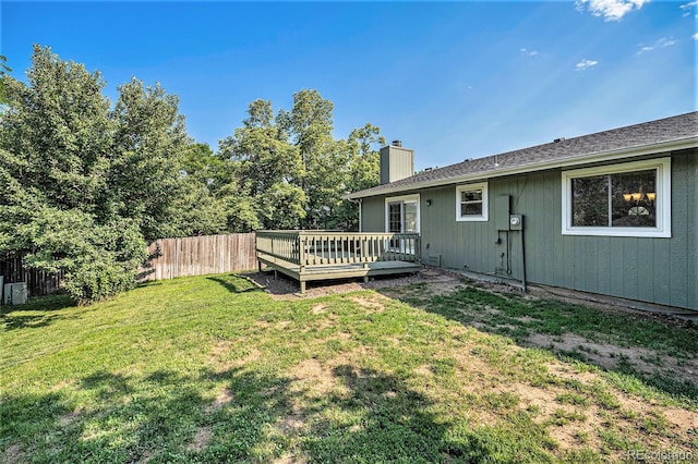 view of yard featuring a wooden deck