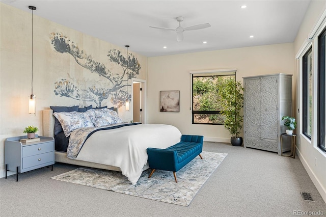 carpeted bedroom featuring ceiling fan