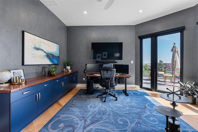 office space with light hardwood / wood-style flooring