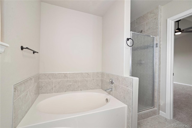 bathroom featuring ceiling fan, separate shower and tub, and tile patterned flooring