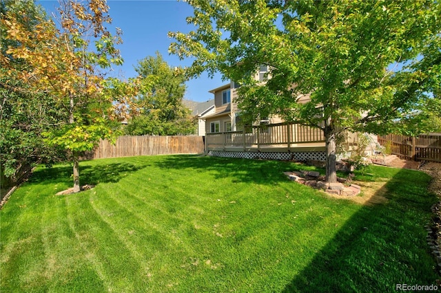 view of yard featuring a deck