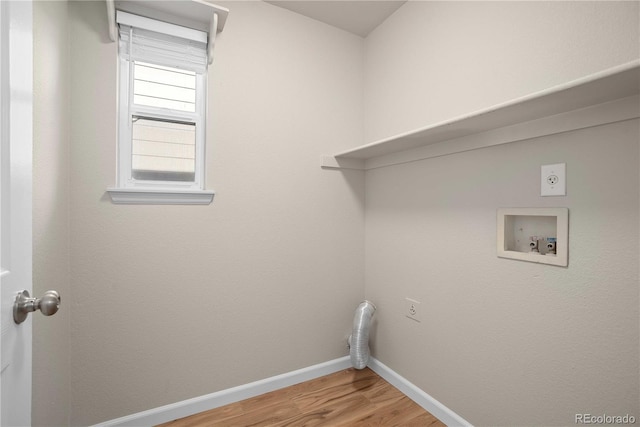 laundry area featuring hardwood / wood-style floors, hookup for a washing machine, and hookup for an electric dryer