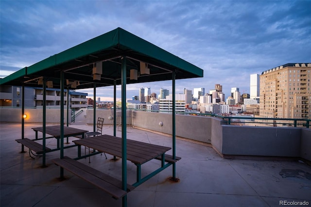 view of patio terrace at dusk