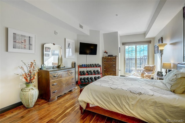 925 N Lincoln St Unit 14C, Denver, CO 80203 - bedroom with wood finished floors