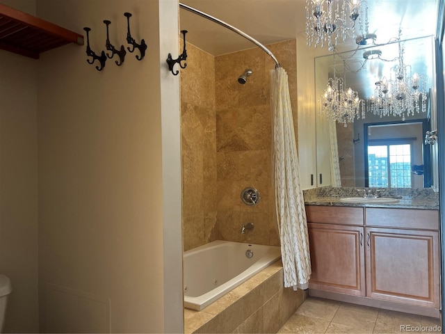 925 N Lincoln St Unit 14C, Denver, CO 80203 - full bath featuring a chandelier, tiled shower / bath combo, vanity, toilet, and tile patterned flooring