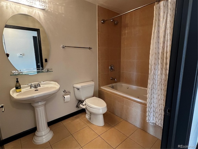 925 N Lincoln St Unit 14C, Denver, CO 80203 - bathroom with tiled shower / bath, toilet, and tile patterned floors