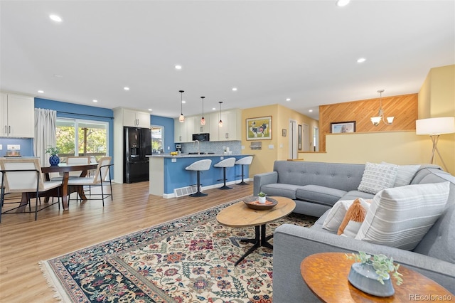 15000 W 29th Ave, Golden, CO 80401 - living area with light wood-style floors and recessed lighting