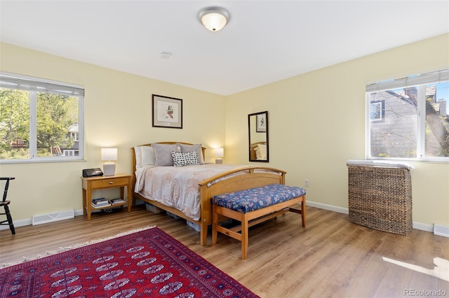 15000 W 29th Ave, Golden, CO 80401 - bedroom with light wood-style flooring and baseboards