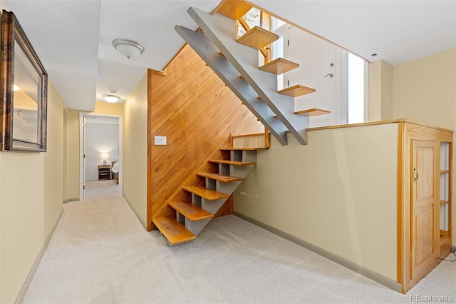 15000 W 29th Ave, Golden, CO 80401 - stairs featuring carpet, wood walls, and baseboards