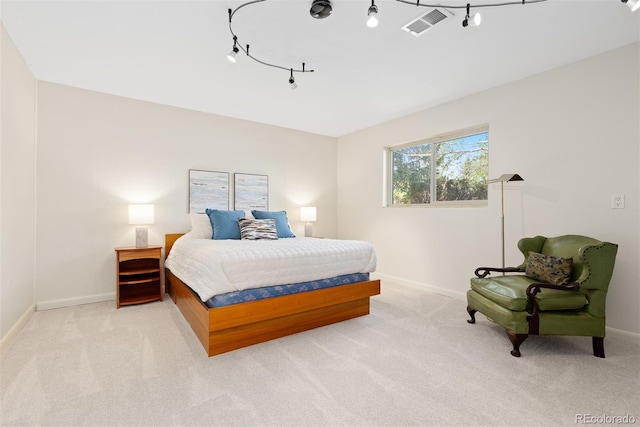 15000 W 29th Ave, Golden, CO 80401 - carpeted bedroom featuring baseboards and track lighting