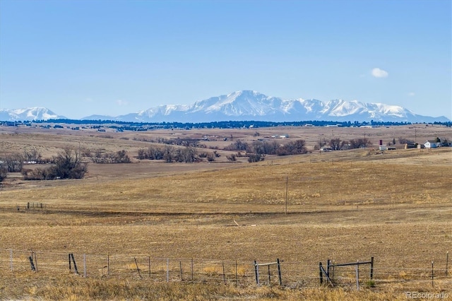 view of mountain feature with a rural view