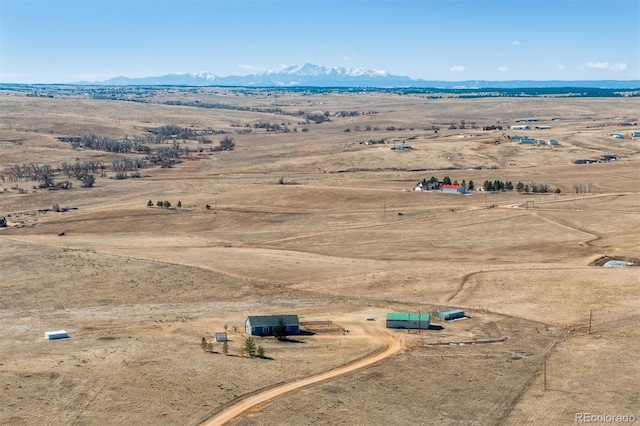 drone / aerial view with a rural view and a mountain view