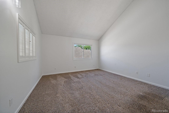 4246 S Granby St Unit B, Aurora, CO 80014 - carpeted empty room featuring a textured ceiling and vaulted ceiling