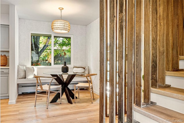 dining room with breakfast area and light wood-type flooring