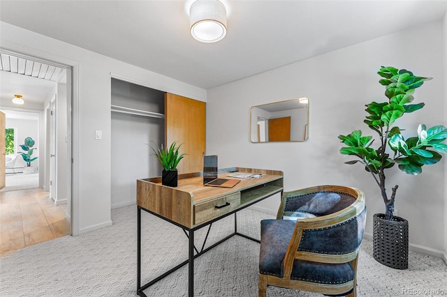 home office with hardwood / wood-style floors