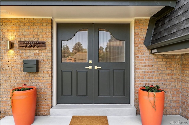 entrance to property featuring french doors