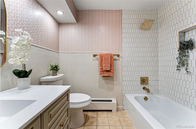 full bathroom with shower / washtub combination, a baseboard radiator, toilet, vanity, and tile patterned flooring