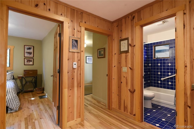446 Blue River Rd, Breckenridge, CO 80424 - hall featuring light wood-type flooring and wooden walls