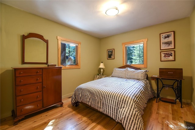 446 Blue River Rd, Breckenridge, CO 80424 - bedroom featuring light wood-type flooring and baseboards