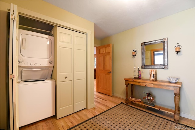 446 Blue River Rd, Breckenridge, CO 80424 - laundry room with stacked washer / drying machine and light wood-style flooring