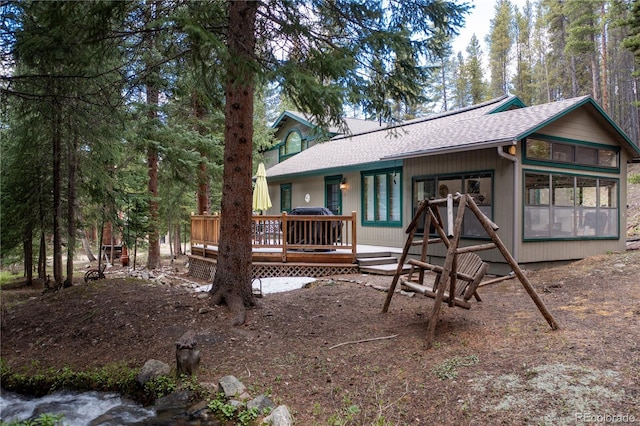 446 Blue River Rd, Breckenridge, CO 80424 - rear view of house with a shingled roof and a deck