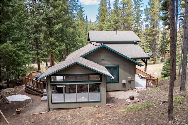 446 Blue River Rd, Breckenridge, CO 80424 - rear view of property featuring roof with shingles and a wooden deck