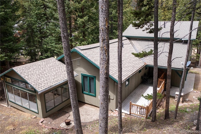 446 Blue River Rd, Breckenridge, CO 80424 - view of side of home featuring a sunroom and roof with shingles