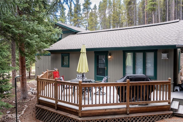 446 Blue River Rd, Breckenridge, CO 80424 - rear view of house with a shingled roof and a deck