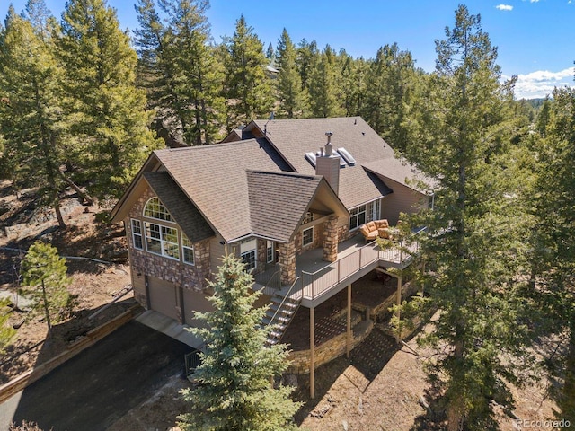 6530 Ridgeview Dr, Morrison, CO 80465 - aerial view of property and surrounding area featuring a heavily wooded area