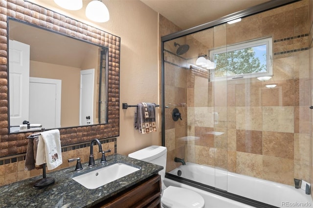 6530 Ridgeview Dr, Morrison, CO 80465 - full bath featuring toilet, tasteful backsplash, vanity, and bath / shower combo with glass door