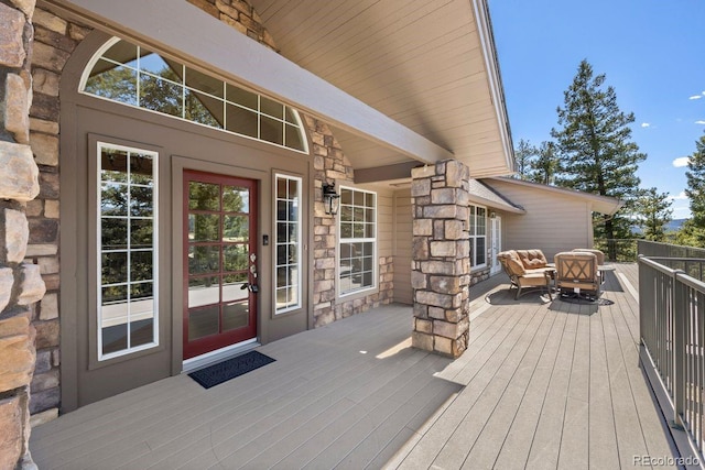 6530 Ridgeview Dr, Morrison, CO 80465 - wooden deck with an outdoor hangout area