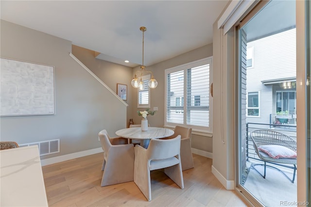 dining area featuring light hardwood / wood-style flooring