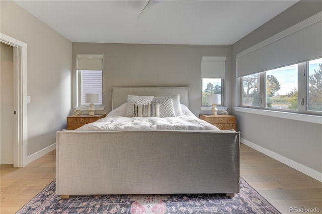 bedroom with light hardwood / wood-style flooring