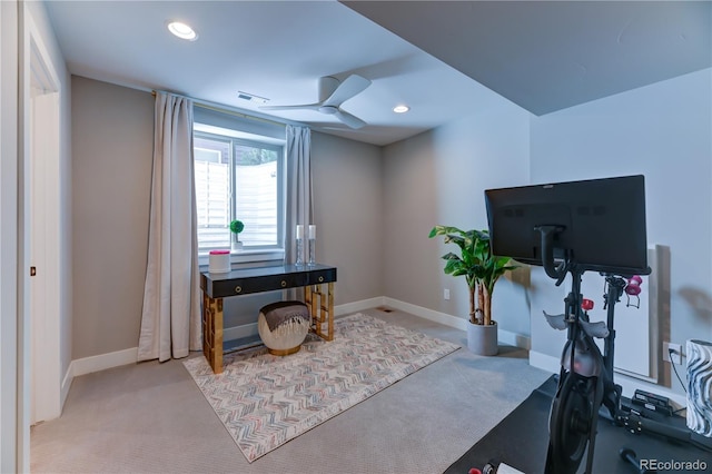 home office with light colored carpet and ceiling fan