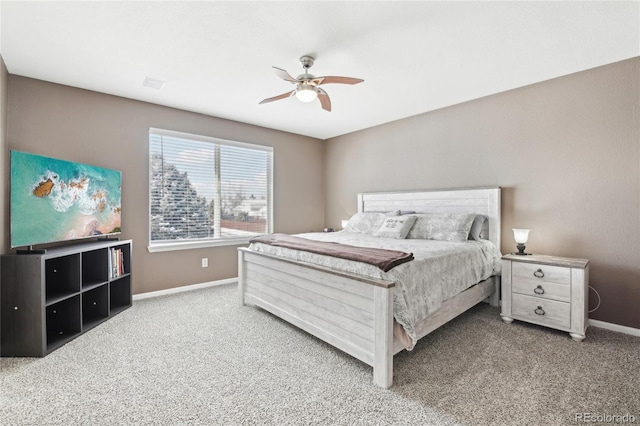 bedroom with ceiling fan and carpet