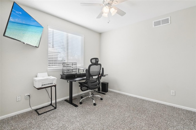 home office with carpet flooring and ceiling fan