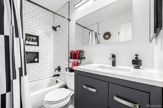 19661 E Girard Ave, Aurora, CO 80013 - full bathroom with shower / bath combination with curtain, toilet, and vanity
